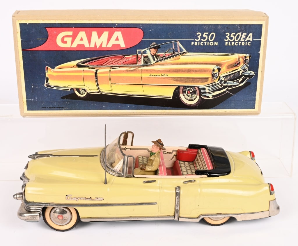 GAMA 350 TIN FRICTION 1954 CADILLAC HARD TOP: Very nice Gama tin friction Cadillac. All original in nice condition. Still has composition driver. Friction works. With reproduction Box. 12" Excellent