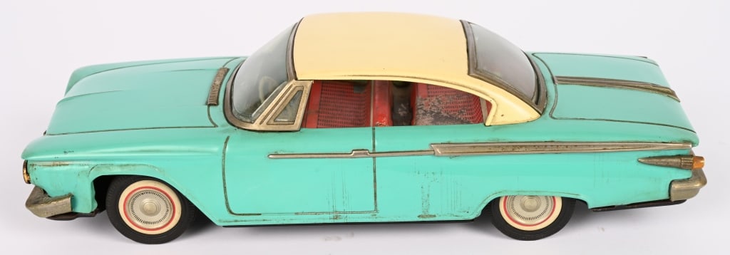 ICHIKO TIN FRICTION 1961 PLYMOUTH HARD TOP: Very 1961 Plymouth. All original in great shape. Friction works. Hard to find car. 12" Excellent