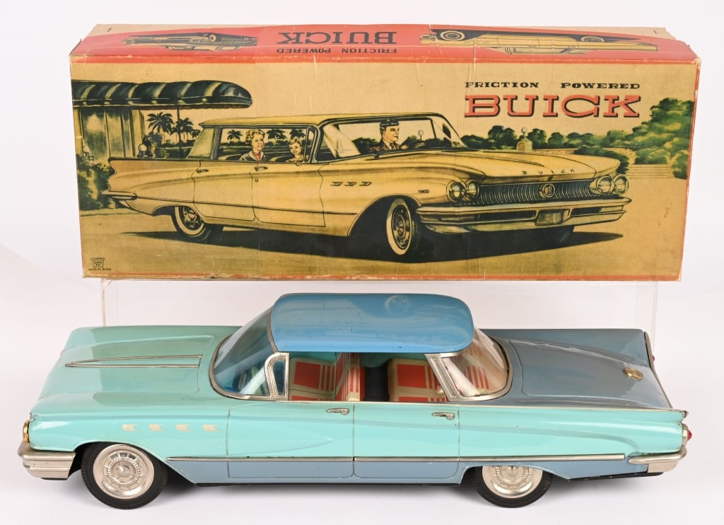 ICHIKO TIN FRICTION 1960 BUICK SEDAN: Large and impressive 1960 Buick Sedan. All original and complete. Has very nice 2 tone blue paint. Friction works. Hard to find tin car in great condition. With reproduction Box. 17" Excellent