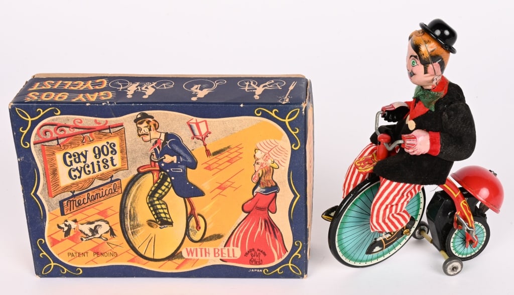TPS TIN WINDUP GAY 90's CYCLIST w/ BOX: All original in nice condition. Works. Boxed 7" Excellent