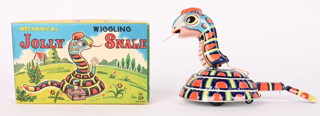 TPS TIN WINDUP JOLLY SNAKE w/ BOX: All original and looks never played with condition. Windup works. hard to find. Boxed 6 1/2" Excellent