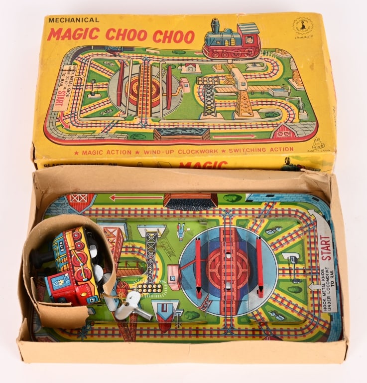 TPS TIN WINDUP MAGIC CHOO CHOO w/ BOX: All original in great shape. Windup works. Boxed 9" Excellent