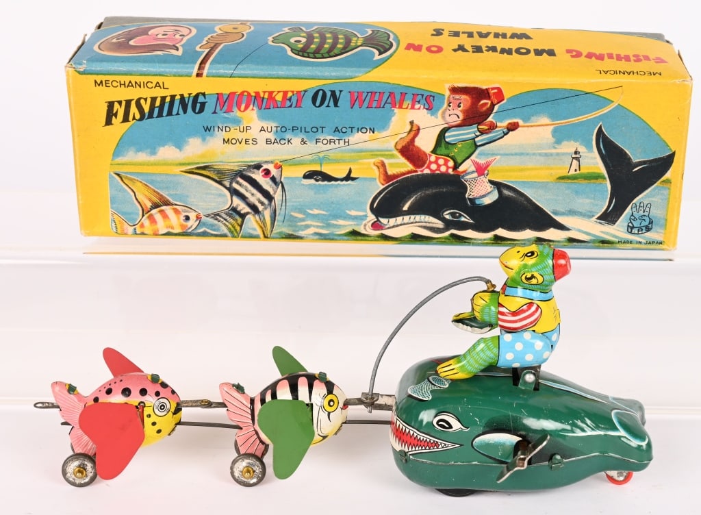 TPS TIN WINDUP FISHING MONKEY ON WHALE w/ BOX: All original in great shape. Windup works. Boxed 9" Excellent