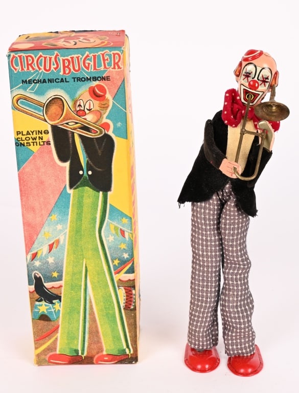 TPS TIN WINDUP CIRCUS BUGLER w/ BOX: All original in great condition. Windup works. Boxed 9" Excellent