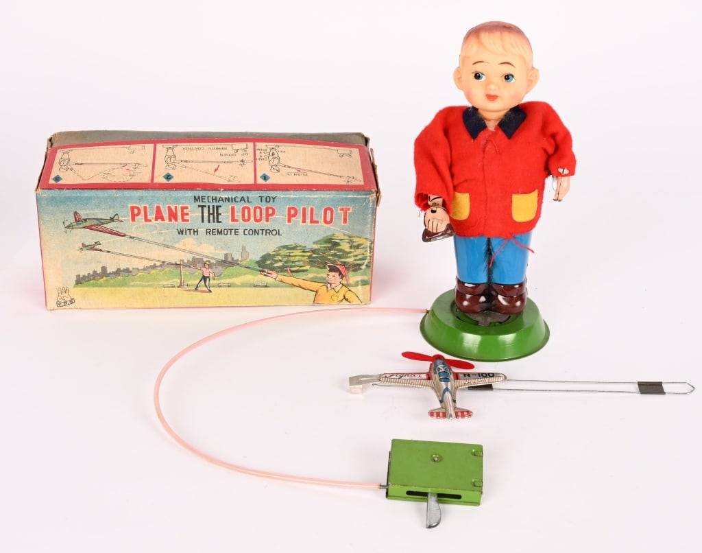 TPS BATTERY OP LOOP THE LOOP PILOT w/ BOX: All original in great shape. Worked when tested. Hard to find toy. Boxed 8 1/2" Excellent