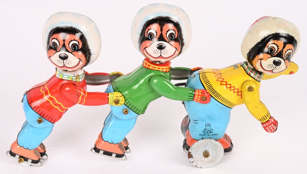 TPS TIN WINDUP CHAMPS ON ICE: All original in great shape. Windup works. 8 1/2" Excellent