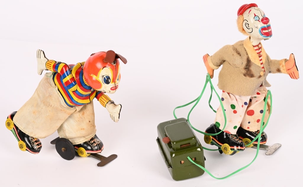 2-- TPS SKATERS: Includes windup Rabbit Skater and battery operated Skating Clown not working. Both in nice shape. 7" Excellent