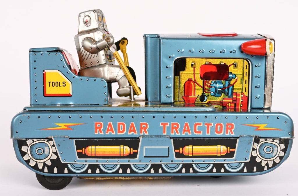JAPAN BATTERY OP RADAR TRACTOR: All original with Robot Driver. Clean condition. Missing on/off switch and antenna. 8" Excellent