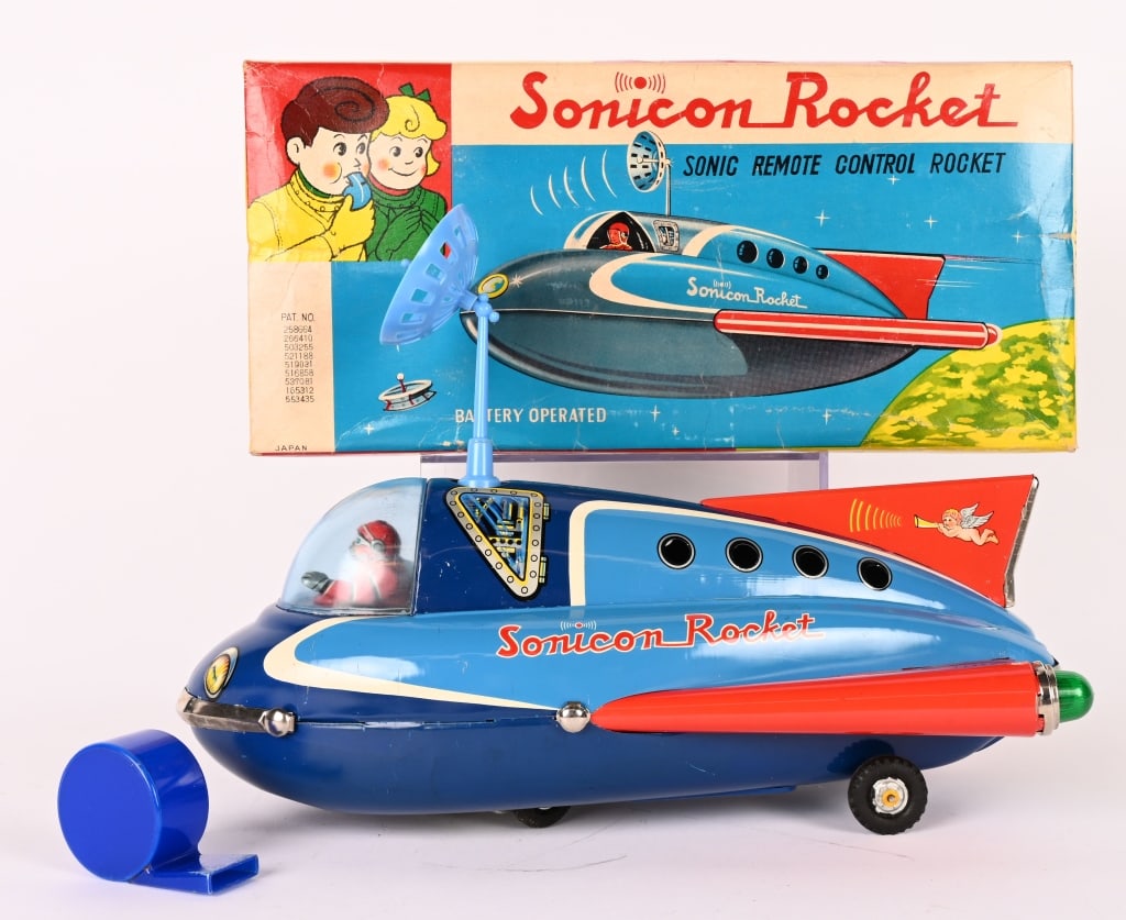 JAPAN BATTERY OP SONICON ROCKET w/ BOX: All original large Space Toy. Very nice condition. Drive wheels are loose. Comes with Whistle and Antenna. Did not operated when tested. With original Box Top. 14" Excellent