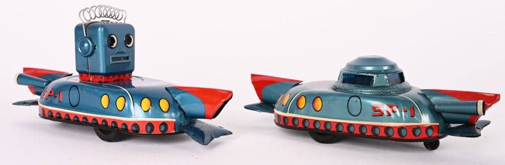 2- JAPAN TIN FIRCTION SP-I SPACE CARS: Great lot inclides both versions of the SP-1 Space Cars. Both all original in great shape. Frictions work. 6 1/2" Excellent