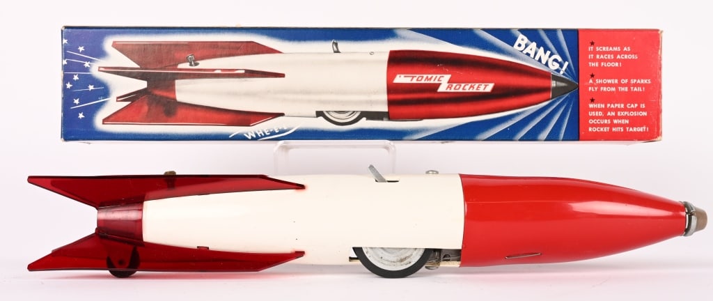 WOODETTE WINDUP TOMIC ROCKET w/ BOX: All original never played with condition. Boxed 15" Excellent