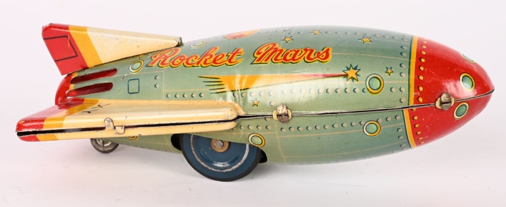 JAPAN TIN FRICTION ROCKET MARS: All original with great colors. Friction works. 5 1/2" Excellent