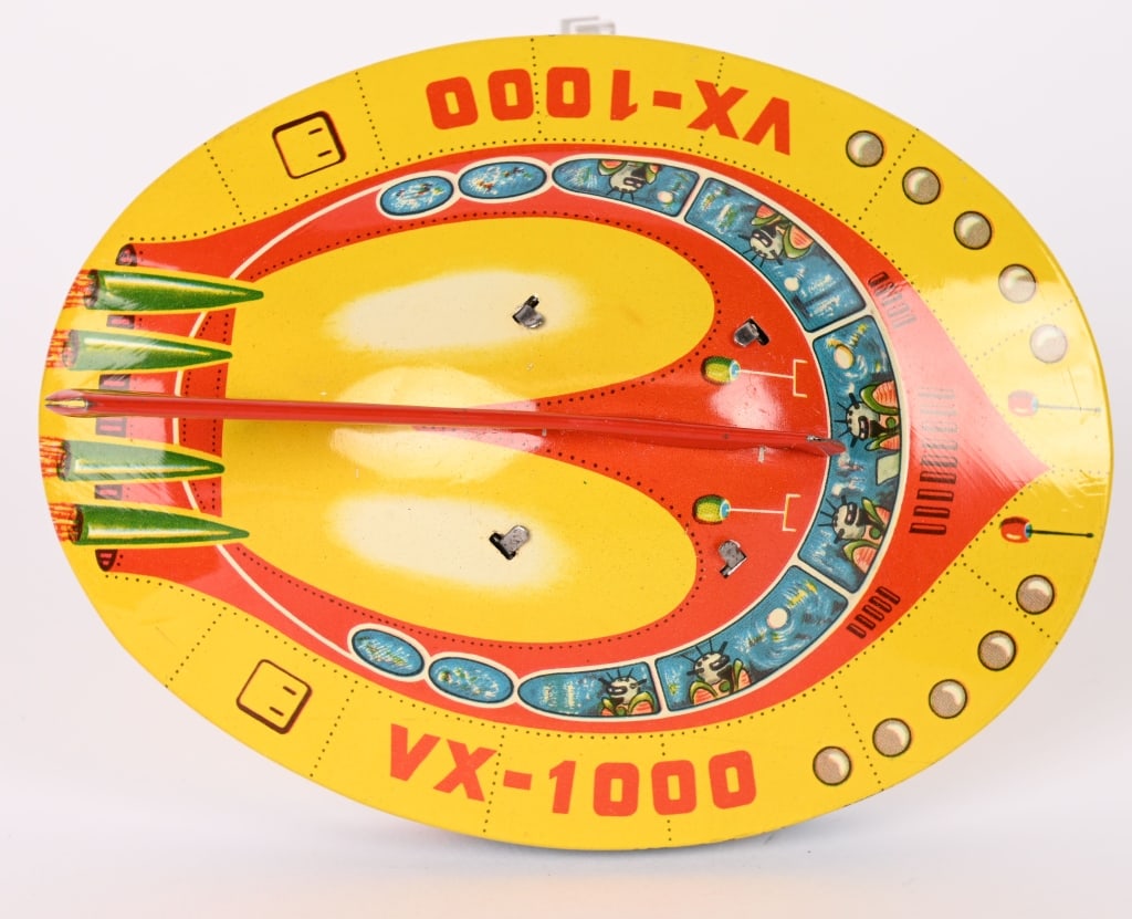 W GERMAN TIN WINDUP VX-1000 SPACESHIP: Made in Western Germany. All original in great condition. Windup works. 5 1/2" Excellent