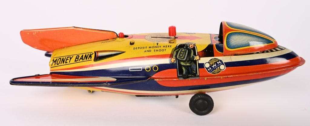 GERMAN TIN TURBO JET MECHANICAL BANK: All original with nice colors and graphics. Works. Still has key. 7 1/2" Excellent