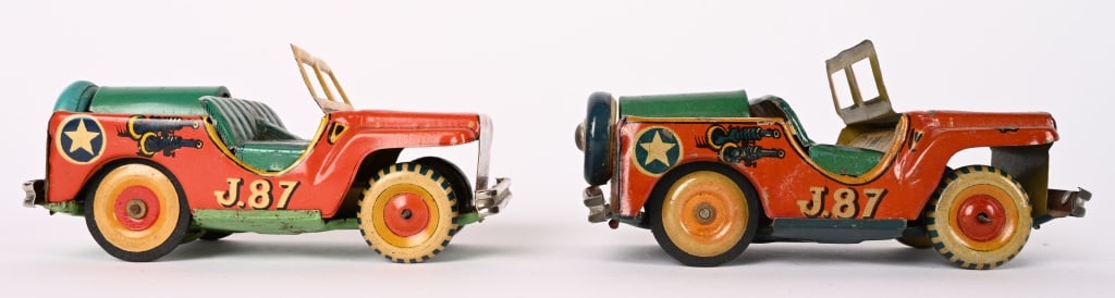 2- JAPAN TIN FRICTION J.87 SPACE JEEPS: Both all original with nice colors. One friction not working. 5" Excellent