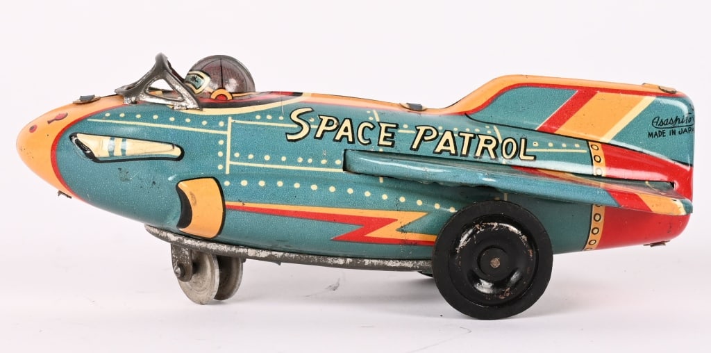 JAPAN TIN WINDUP SPACE PATROL ROCKET: All original with nice colors. Windup works. 5 1/2" Excellent