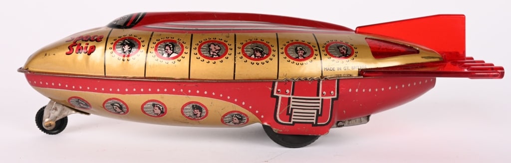 WELLS BRIMTOY TIN FRICTION SPACE SHIP: All original with nice graphics. Friction works. 9" Excellent