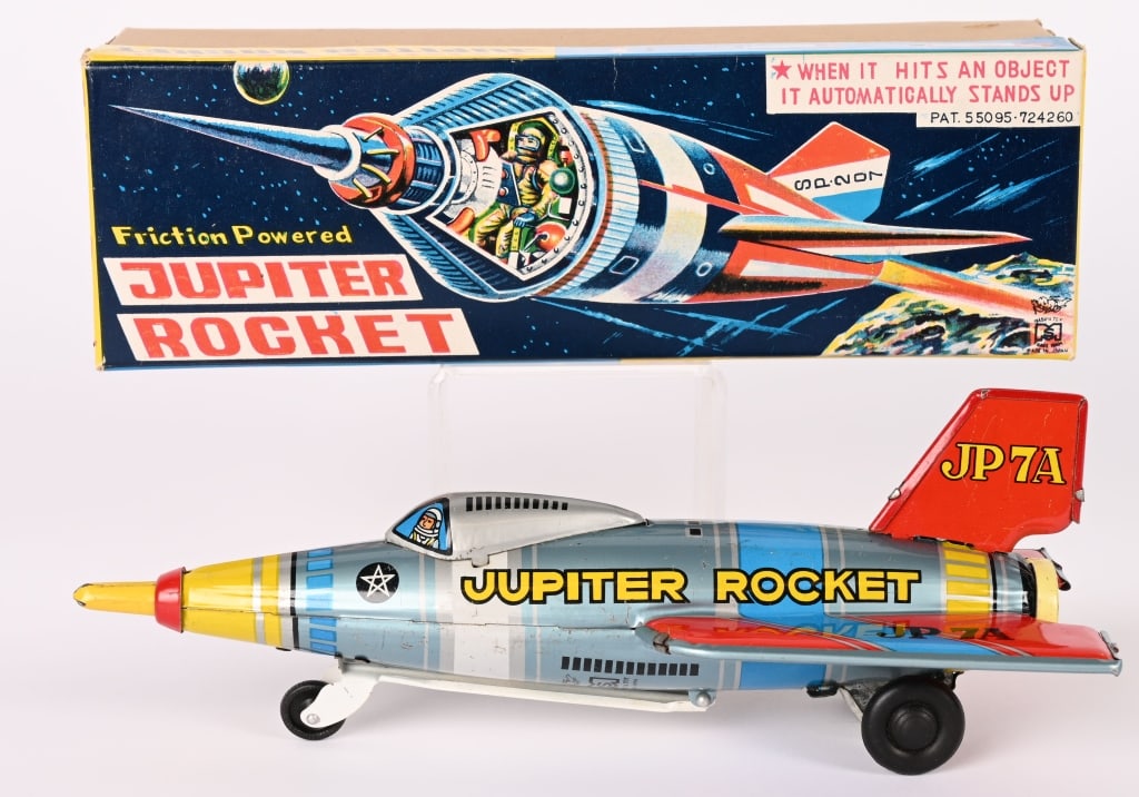 JAPAN TIN FRICTION JUPITER ROCKET w/ BOX: All original looks never played with condition. Works. Boxed 9 1/2" Excellent