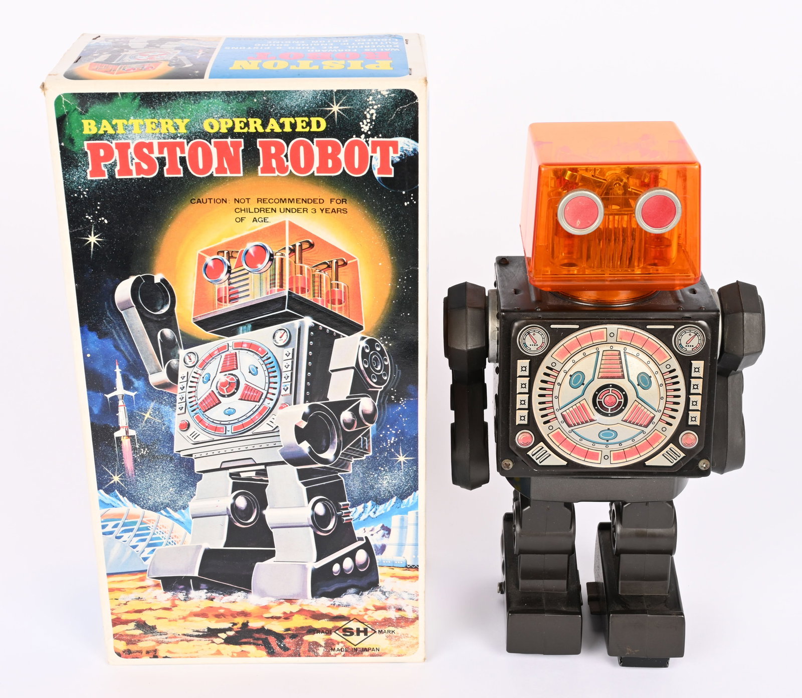 JAPAN BATTERY OP PISTON ROBOT w/ BOX: All original in great condition. Battery box is clean. Worked when tested. Has a very tiny chip on bottom edge of head. Could possibly be from the factory. With crisp Box. 11 1/2" Excellent