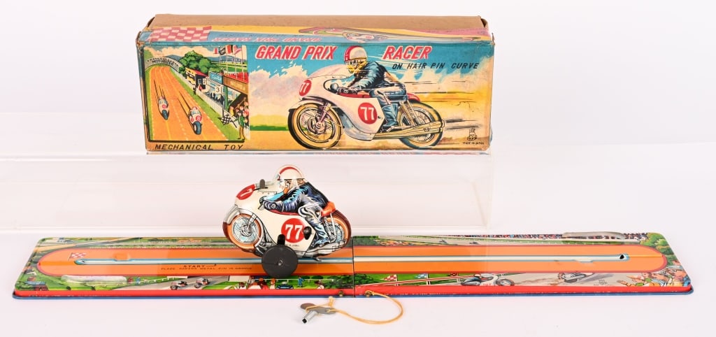 TPS GRAND PRIX RACER ON HAIR PIN CURVE w/ BOX: All original tin windup Motorcycle with Race Track. Looks never played with. Works. Boxed 10 1/2" Excellent