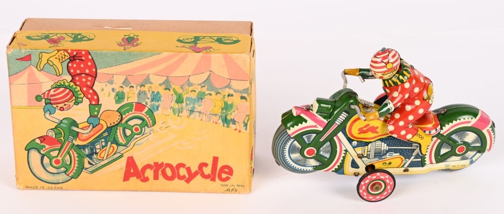JAPAN TIN FRICTION CLOWN ACROCYCLE w/ BOX: All original looks never played with. Great colors. friction works. Boxed 6 1/2" Excellent