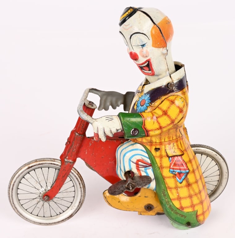 TECHNOFIX TIN WINDUP MERRY CLOWN CYCLE: All original in nice condition. Windup works. 5 1/2" Excellent