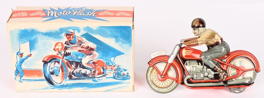 TECHNOFIX TIN WINDUP RACING MOTORCYCLE w/ BOX: All original in great shape. Friction works. Boxed 7" Excellent