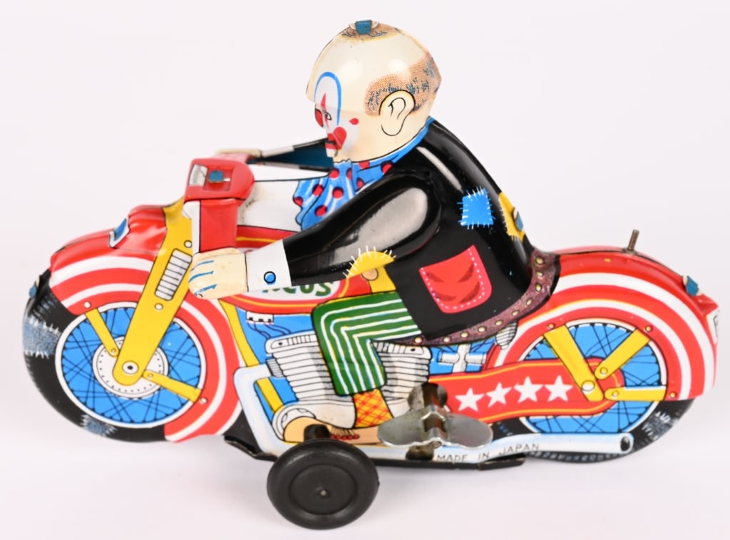 JAPAN TIN WINDUP CIRCUS CLOWN MOTORCYCLE: All original with nice colors. Friction works. 6" Excellent