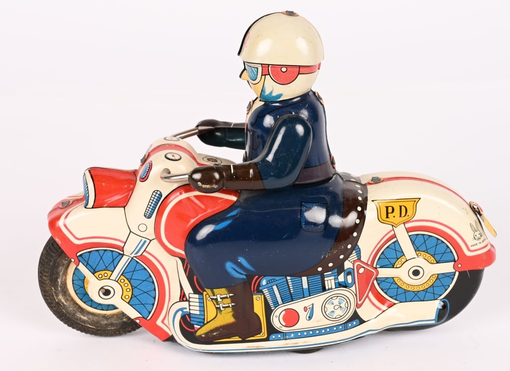 JAPAN TIN FRICTION PD MOTORYCLE: All original with great colors. Friction works. 8" Excellent