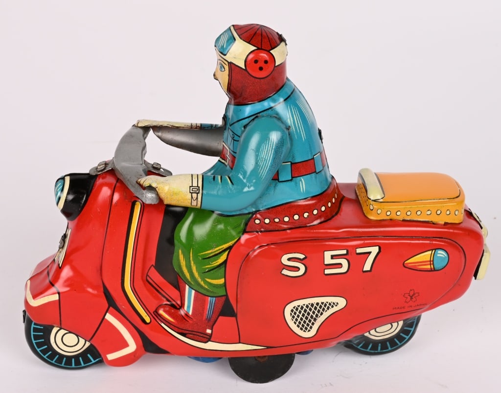 JAPAN TIN FRICTION S 57 SCOOTER: All original in great shape. Very nice colors. Friction works. Unusual example. 7" Excellent
