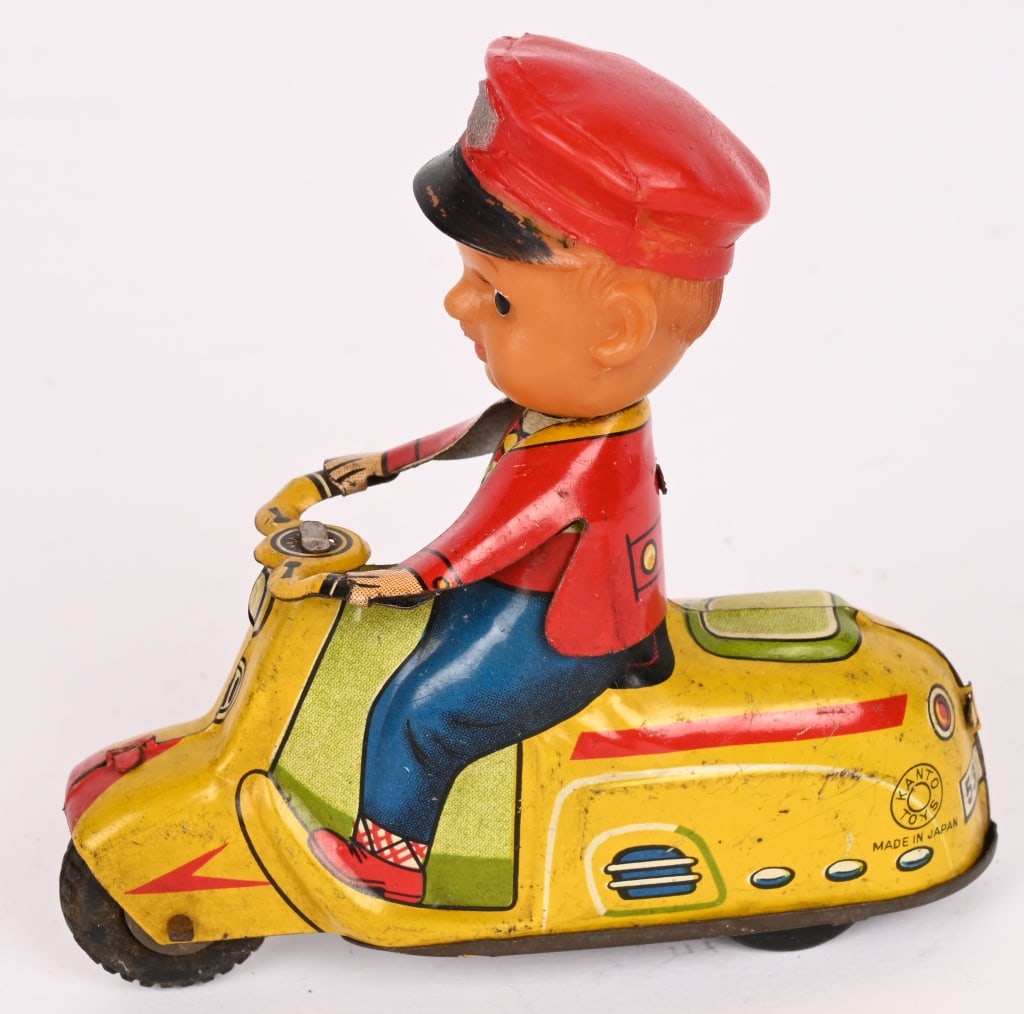 JAPAN TIN FRICTION SCOOTER w/ VINYL HEAD RIDER: All original in great shape. Friction works. Very unusual. 3 1/2" Excellent