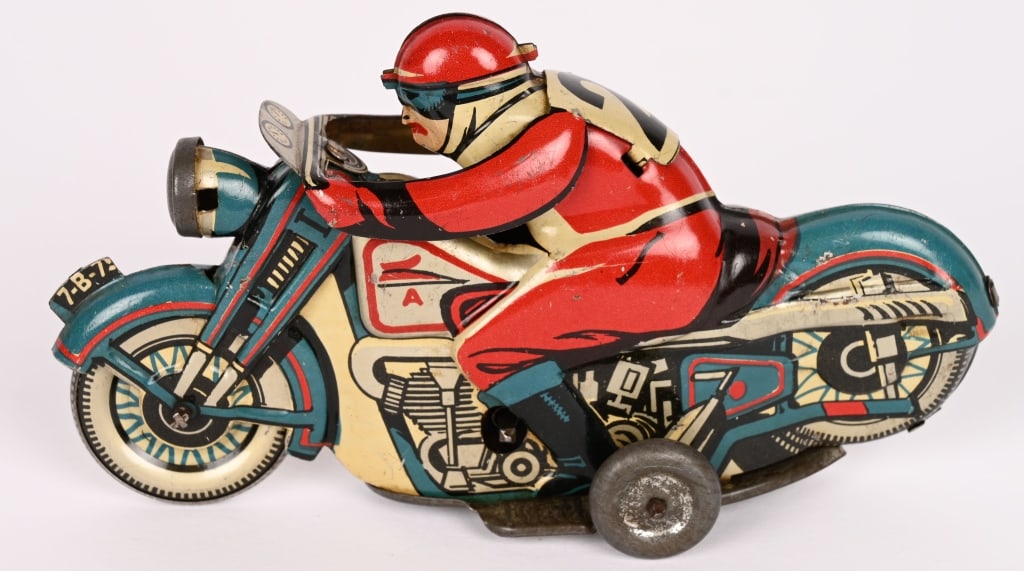 EUROPEAN TIN WINDUP #2 RACING MOTORCYCLE: All original tin windup #2 Racing Motorcycle. Front license plate marked 7-B-75. Windup works. 5 1/2" Excellent