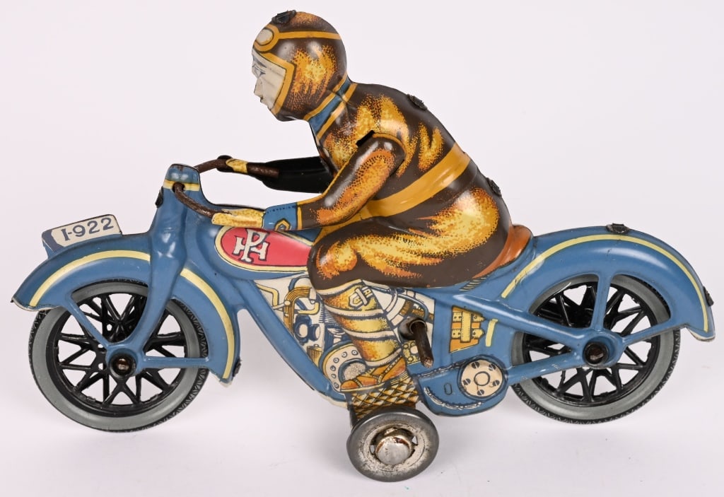 PAYA TIN WINDUP CIVILIAN MOTORCYCLE: All original in great condition. Nice colors. Windup works. 6 1/2" Excellent