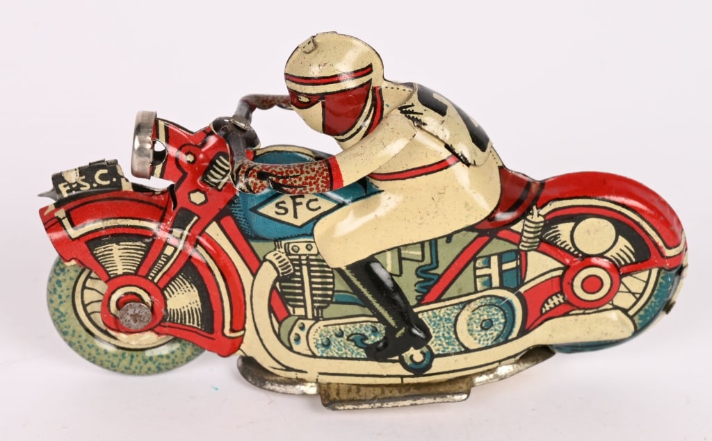 SFC ITALY TIN PENNY TOY MOTORCYCLE: All original with nice colors. 3 1/2" Excellent
