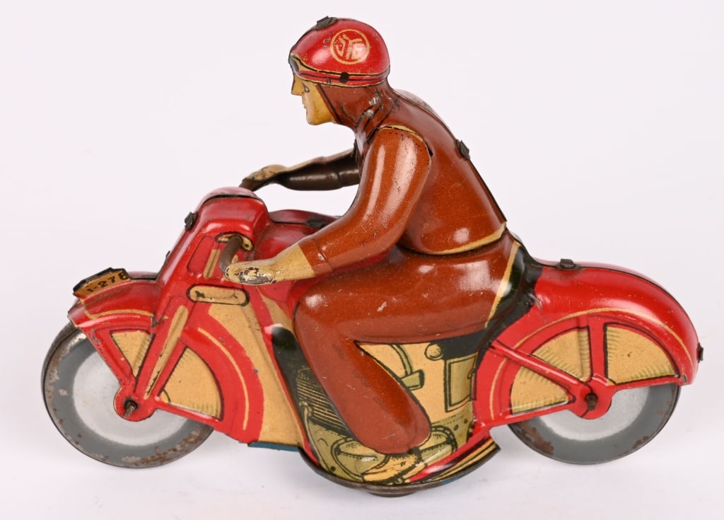 JYE TIN FRICTION CIVILIAN MOTORCYCLE: Spanish friction Civilian Motorcycle. All original and works. 5 1/4" Excellent