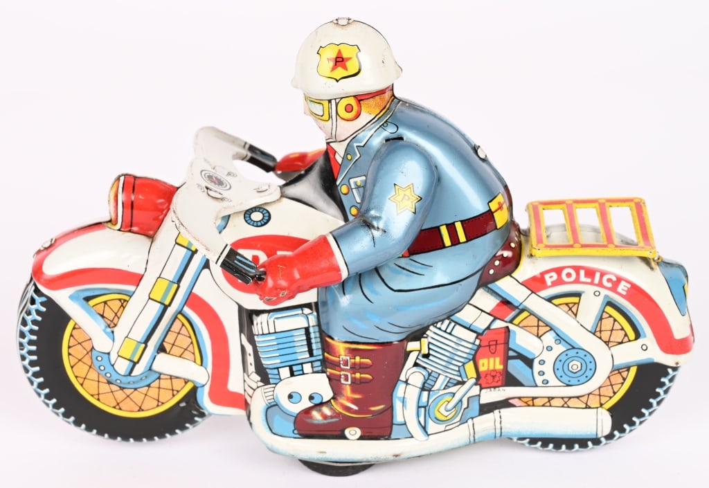 JAPAN TIN FRICTION POLICE MOTORCYCLE: All original with nice colors. Friction works. 8" Excellent