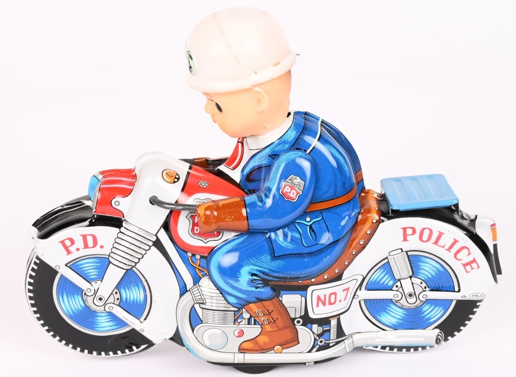 JAPAN TIN FRICTION POLICE MOTORCYCLE: All original with nice colors. Rider has vinyle head. Friction works. 8" Excellent