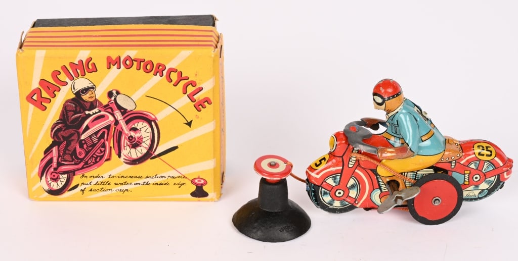 JAPAN TIN WINDUP RACING MOTORCYCLE w/ BOX: All original and looks never played with. Comes with suction cup. Windup works. Boxed 4" Excellent
