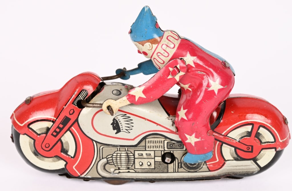 JAPAN TIN WINDUP CLOWN ON INDIAN MOTORYCLE: All original with Indian on tank. Has clown rider. Windup works. 5" Excellent