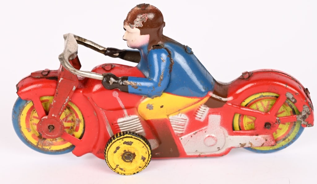 OCCUPIED JAPAN TIN FRICTION MOTORCYCLE: All original in nice shape. marked Occupied Japan on bottom. Friction works. 5" Excellent
