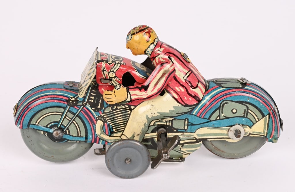 METTOY TIN WINDUP CIVILIAN MOTORCYCLE: Great Britain windup Civilian Motorcycle. All original with nice colors. Windup works. 5 1/2" Excellent