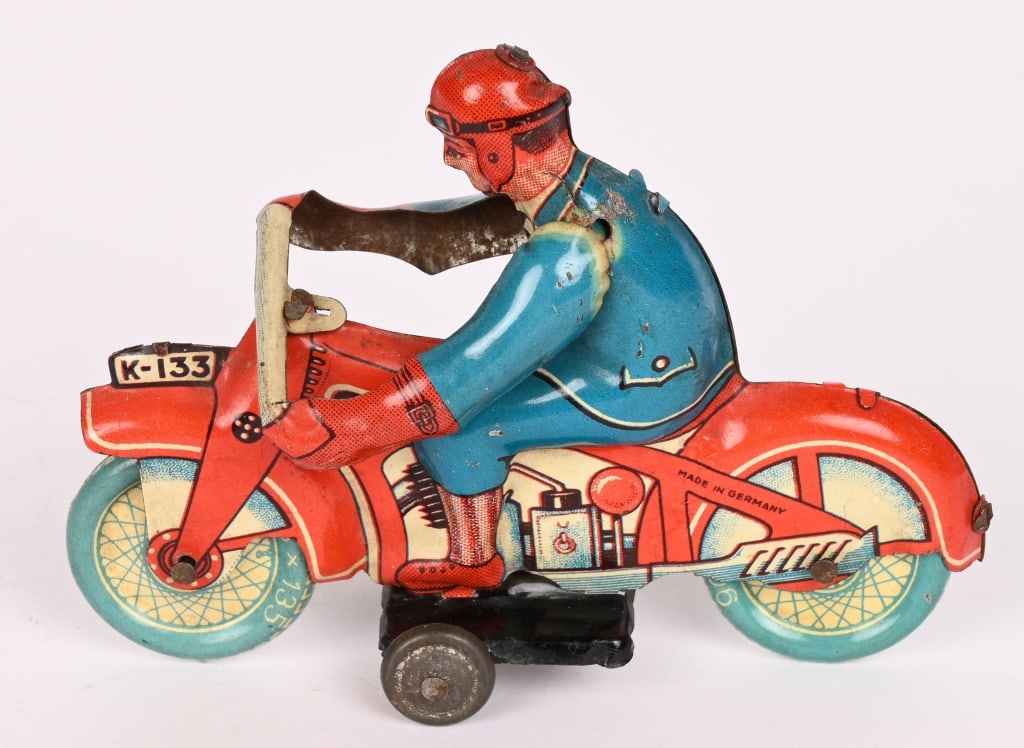 GERMAN TIN CIVILIAN MOTORCYCLE: all original with great colors. 4 1/2" Excellent