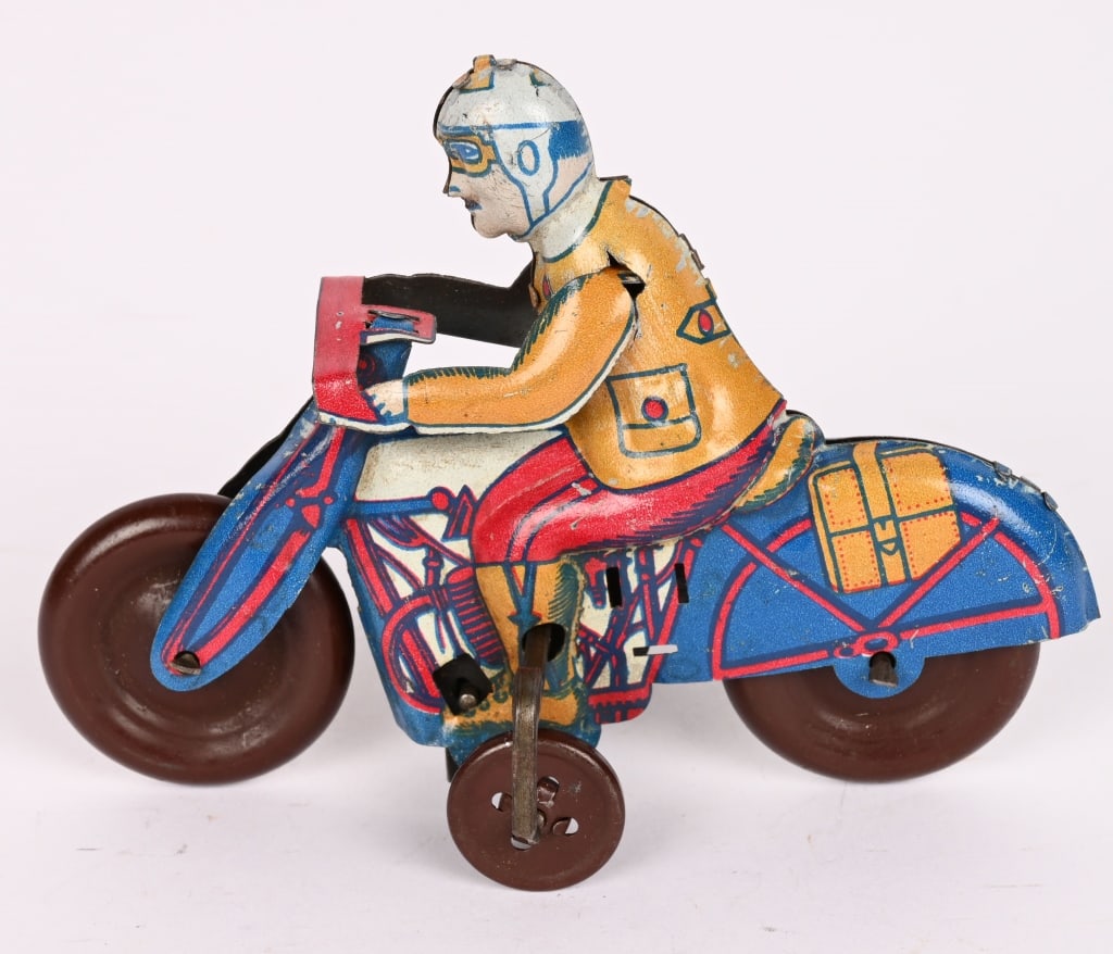 FOREIGN TIN WINDUP MOTORCYCLE: All original with nice colors. No markings. Windup not working. 4 1/2" Excellent