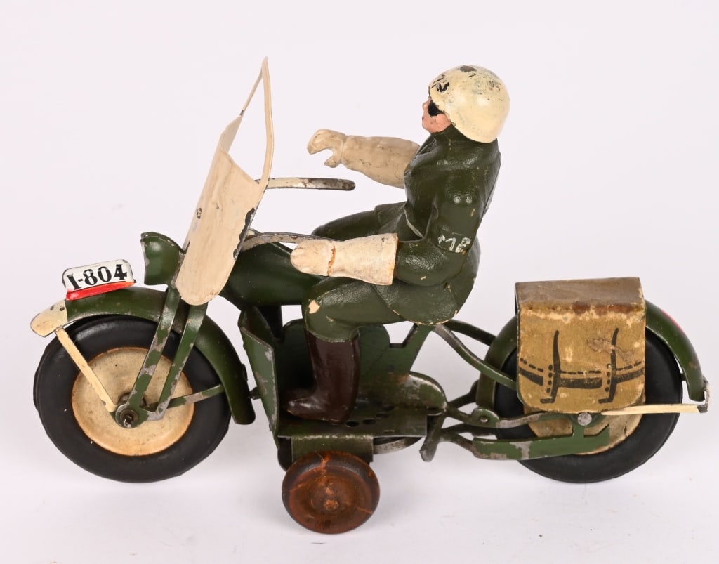 INGAP TIN WINDUP MP MOTORCYCLE: All original in great condition. Still has composition rider. Windup works. 5" Excellent