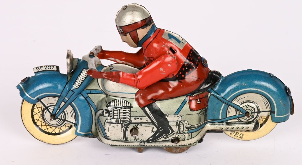 US ZONE GERMANT TIN WINDUP MOTORCYCLE: All original with nice colors. marked US Zone Germany. Windup works. 5 1/2" Excellent