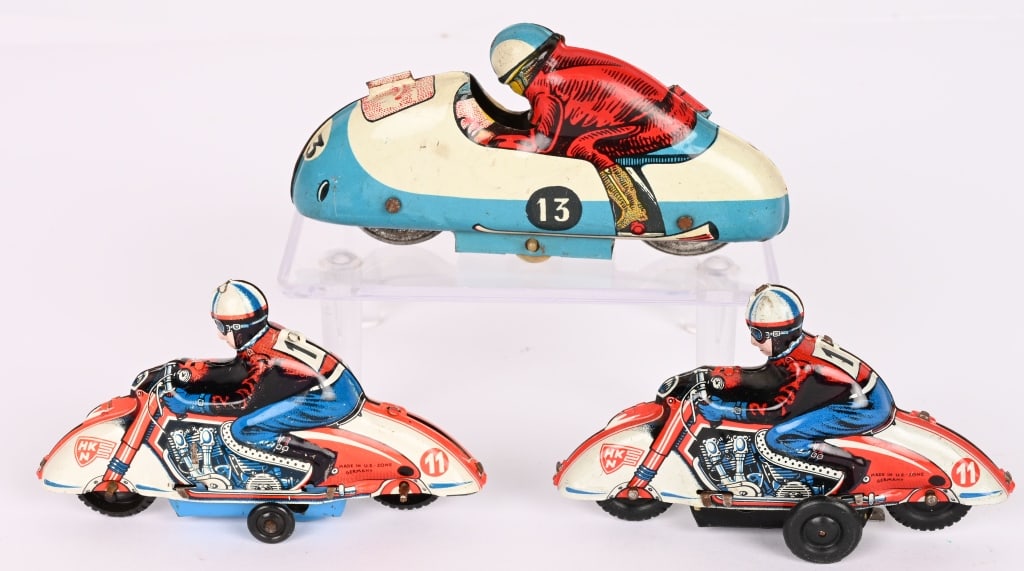 3- RACING MOTORCYLES: 2- Huki US Zone Germany Bikes. One with friction. And tin #13 Racing Bike. All original in great shape. Largest 4 1/2" Excellent