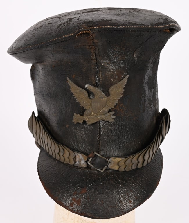 AMERICAN M1824 BELL CROWN TAR BUCKET SHAKO: Very nice U.S. Militia bell crown "tar bucket" shako. Used by regular forces as well as militia units from 1820-1835. Shako retains the original scalloped scales, and star side rosettes and Federal