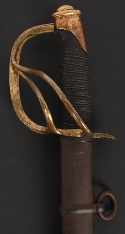 DATED 1859 AMES MODEL 1860 LIGHT CAVALRY SABER: Here is a pre-Civil War Ames saber specimen and forerunner of the type issued to Federal horsemen during the War. Produced by the Chicopee, Massachusetts firm of Ames Sword Company, this weapon is the
