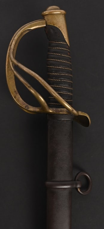 DATED 1859 AMES MODEL 1860 LIGHT CAVALRY SABER: Here is a pre-Civil War Ames saber specimen and forerunner of the type issued to Federal horsemen during the War. Produced by the Chicopee, Massachusetts firm of Ames Sword Company, this weapon is the