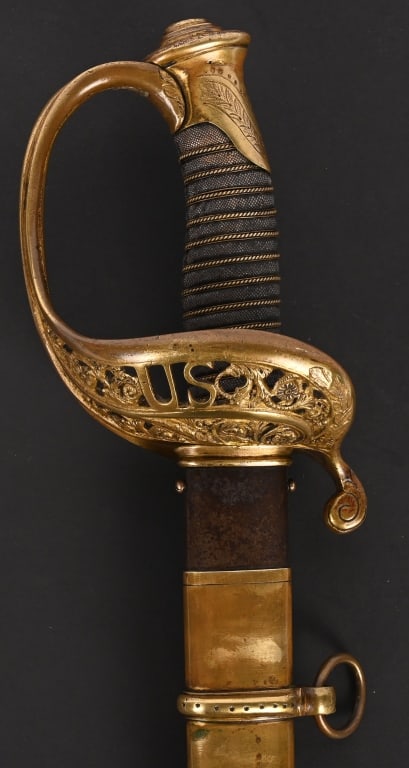 CIVIL WAR STAFF & FIELD OFFICERS SWORD BY CLAUBERG: A very attractive Civil War Staff & Field Officers Sword by Clauberg and was imported by the famous firm Schuyler Hartley & Graham measuring overall 38 inches with a 32 inch, triple engraved blade